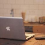Laptop on a wooden table